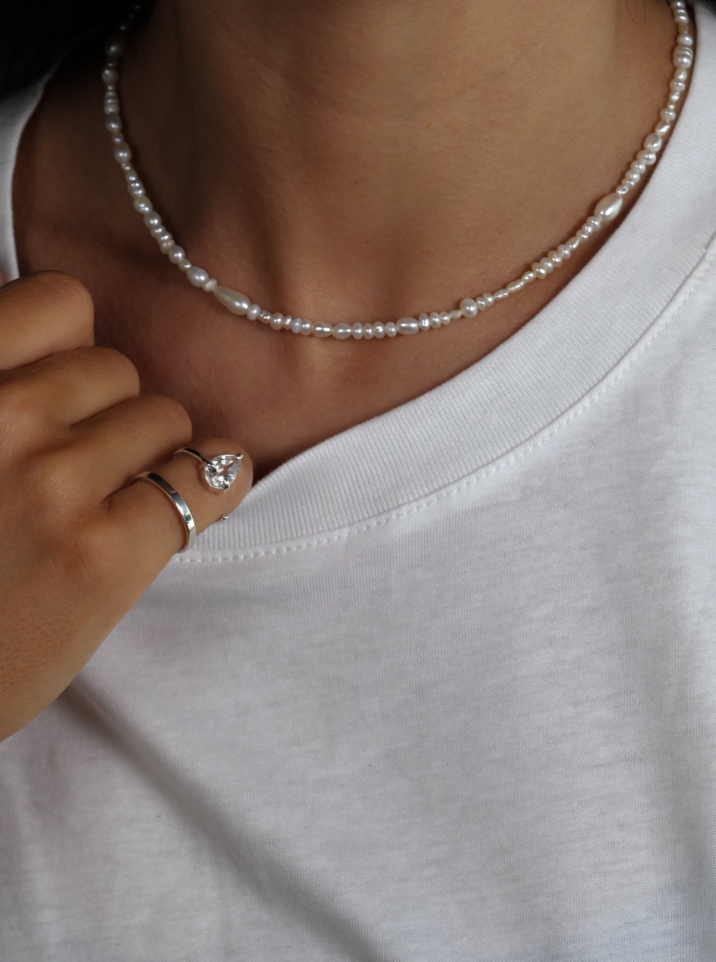 Delicate Handcrafted micro pearl necklace on model