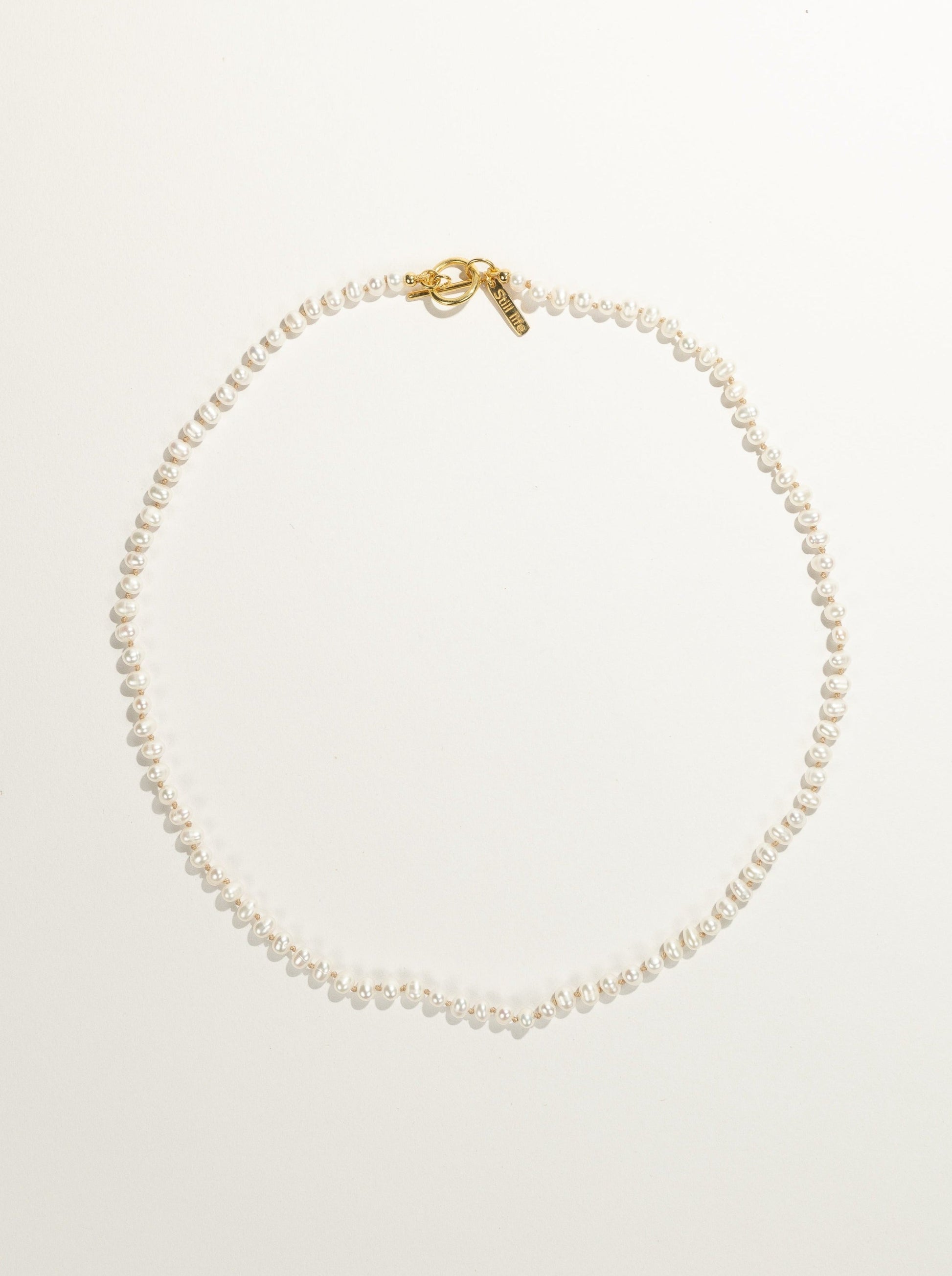 Knotted micro pearl necklace 
